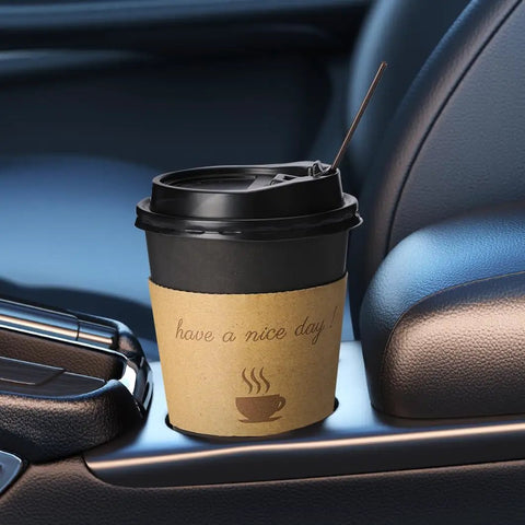 12 oz black coffee cup with lid and straw in car holder, part of 100 Pack 12 Oz Thickened Coffee Cups With Lids Sleeves And Straws For To Go Coffee