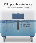 Stay Chill All Day Long With This Portable Evaporative Air Cooler Boasting a clear water filling scale and blue housing.