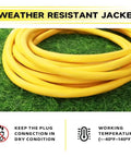 50 Ft Lighted Outdoor Extension Cord With 10/3 SJTW Heavy Duty Yellow Cable, 3 Prong Grounded Plug, UL Listed, LED Indicator End shown coiled on grass with weather resistant jacket emphasized.