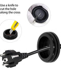 Using a knife to cut a hole in a rubber grommet from 200 Piece Rubber Grommet Set With 7 Sizes For DIY Wiring Electrical and Plumbing Projects