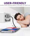 7-Day Digital Outlet Timer For Indoor Plug-In Lights, Lamps And Appliances beside sleeping man with phone charging