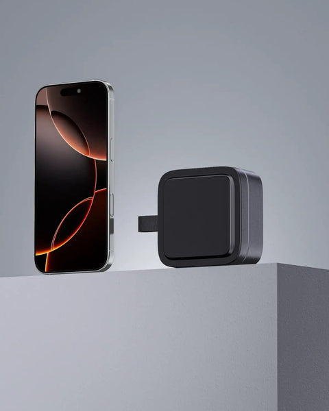 All-In-One MagSafe Wireless Charging Station for iPhone, Apple Watch, and AirPods Pro - Foldable Travel Stand next to smartphone