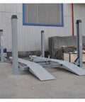 Rock Solid 4 Post Car Lift With Heavy Steel Wire Rope Auto Jack Lifter showing gray heavy-duty frame on concrete floor.