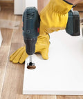 Person using Heavy Duty Eight Piece Forstner Bit Set High Speed Carbon Steel Wood Drilling Kit on white wood.