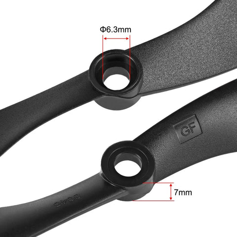 Close-up of black nylon Rugged RC Propellers 8x4.5 Inch Nylon Two Vane CW CCW Set with adapter rings showing 6.3mm shaft.