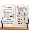 Bamboo Adjustable Book Stand With Tray And Clips holding an open book, showing text and diagrams. Five angle positions visible.