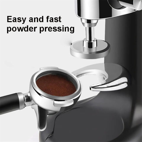 Top Shelf 58 Mm Coffee Tamper With Ergonomic Grip And Solid Steel Base For Zero Sweat Espresso Compaction And Barista Grade Pulls Straight From Your Kitchen Counter, view showing coffee grounds being compacted.