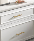 Champagne Bronze Cabinet Pulls Two And A Half Inch 64mm 30 Pack Brushed Gold Drawer Handles in kitchen setting