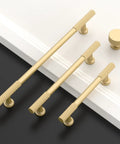 Swanky Brushed Gold Kitchen Cabinet Knobs And Drawer Pulls Set Of 10 Top Shelf Hardware For Modern Farmhouse Decor Easy Install solid metal knobs and pulls on a contrasting background