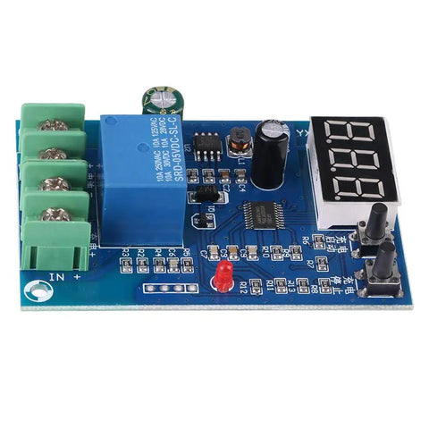No Sweat Battery Charge Control Module With Crisp Digital Screen For Easy Six To Sixty Volt Charging And Discharging Ten Amp Setup Sweet For Solar Wind Cars And Ev Rides, blue circuit board with digital display.