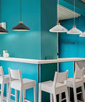 Nordic Industrial Pendant Light E26 Adjustable Height Wood Metal Chandelier for Kitchen Island Dining Room(White,35cm) over a sleek bar.