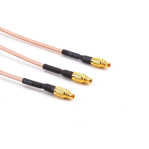 Close-up of MMCX to SMA Female Antenna Extension Cable 95mm Low Loss for FPV Racing Drones and Quadcopters, gold-plated connectors.