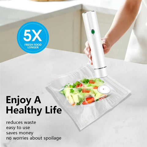 Using Handheld Vacuum Sealer For Food With 30 Reusable Bags to keep salad fresh; quick 10 second seal locks flavor.