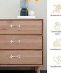 Mini Antique Silver Cabinet Pulls, 20-Piece Set For Small Drawers And Jewelry Boxes, shown on wooden dresser