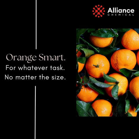 Ultra Pure D Limonene Orange Oil Cleaner And Solvent Two Quart Heavy Duty Degreaser with fresh oranges on display.