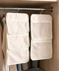 Game Changer 2 Pack Mesh Hanging Closet Storage Organizers Beige Foldable Bra And Sock Storage Pockets organized in a wardrobe.