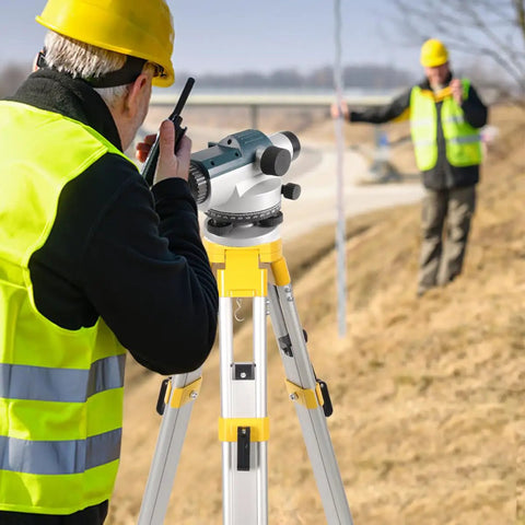 Pro Grade 32x Automatic Transit Level AL32 Self Leveling Optical Level tripod setup with surveyor on construction site