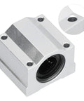 Top Shelf Heavy Duty 20mm Aluminum Linear Ball Bearing Slide Block With Slick Rolling Bushings For Precision Cnc Machines and Electronic Gear Linear Motion Guide Shaft, close-up of aluminum slide block.