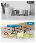 Under Cabinet Mug Hooks Set, 3 Pack With 9 Hooks, Easy Cup Hanger For Displaying Coffee Mugs, Cups And Kitchen Utensils, Rust-Resistant Stainless Steel, Space-Saving Black Finish installed under a cabinet showcasing mugs organized efficiently.