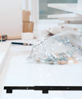Slick Glide Keyboard Tray Slides With Bottom Mount Drawer Rails 35mm Width Cold Rolled Steel on workspace with tools.