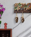 Handcrafted Solid Wood Wall Mount Coat Rack with floral design, two hooks for keys in rustic style, 520 by 300 mm.