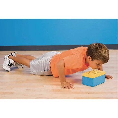 Child using Unbreakable Soft Foam Push Up Block For Proper Form Training Learn To Stop On Contact And Push Back Up Perfect For Home Gym Gains And PT Sessions This 8 Inch By 5 Inch Block Elevates Pushups And Reduces Strain on floor.