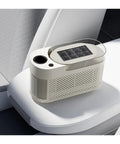 Slick Countertop Ice Maker, Portable Mini Electric Machine Making Crisp Fresh Cubes Fo Sho Fast for home use on a white seat.