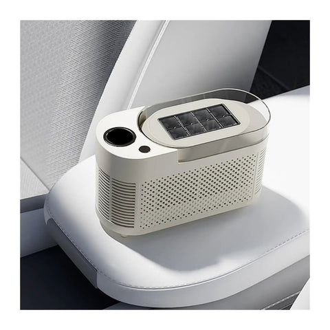 Slick Countertop Ice Maker, Portable Mini Electric Machine Making Crisp Fresh Cubes Fo Sho Fast for home use on a white seat.