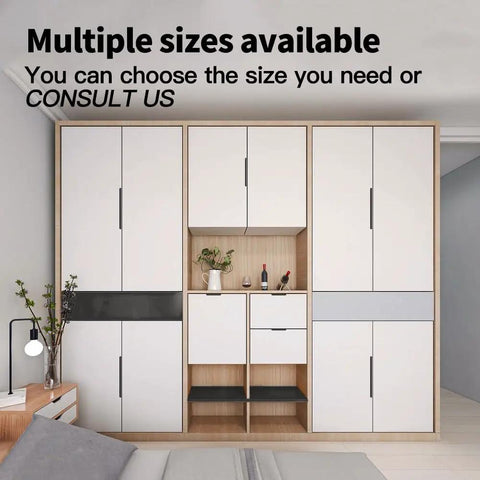 White modern wardrobe with multiple cabinet sizes available in a bedroom setting
