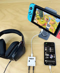 MAI Mini Mobile Audio Interface With Zero Latency Monitoring And High Fidelity Headphone Output connected to tablet and phone