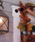 Heavy Duty Industrial Hook And Loop Fasteners With Rock Solid Adhesive Backing Water Resistant Sticky Pads For Indoor And Outdoor Use Tough Circular Disc Strips Hold Up To Ten Pounds holding wreath with autumn leaves on a door frame.