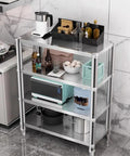 Top Shelf 3 Tier Stainless Steel Media Cart For Home Entertainment Setup Zero Sweat Audio Video Gear Stand with kitchen items.