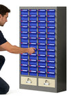Heavy Duty Tough As Nails Blue Parts Cabinet With Up To One Hundred Drawers For Screws Bolts Nails Small Items And Crafts Top Shelf Workshop Organization No Sweat Storage Setup shown with user accessing drawers.