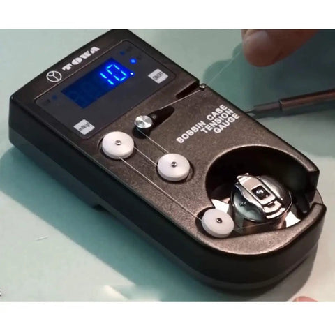 Digital Bobbin Case Tension Gauge By Towa With L And M Style Inserts Ready To Compare With TM-1 L Style And TM-3 M Style Includes TM-501 Small Bobbin Insert And TM-502 Jumbo Insert Compact Pro Grade Tension Tester For Sewing Machines. bobbin case with digital display