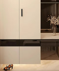 Matte black vintage zinc alloy cabinet handle on modern beige wardrobe, sturdy upgrade for furniture renovation.