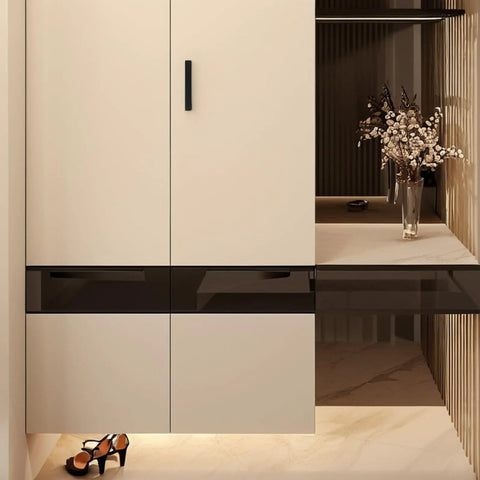 Matte black vintage zinc alloy cabinet handle on modern beige wardrobe, sturdy upgrade for furniture renovation.
