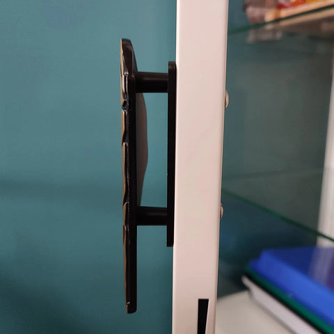Side view of 2-Piece Cabinet Handle Adapter Set for Milsbo Greenhouse Cabinets installed, showing aluminum adapter and screws on cabinet door.