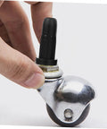 Solid Black Nylon Chair Leg Floor Protectors For Swivel Office Chairs Anti Scratch Furniture Feet Caps on a roller wheel.
