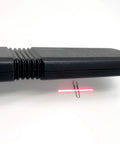Lumber Wizard 5 metal detector for woodworking, black handheld plastic grip with red laser sight