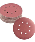 Super Smooth Results With 200 Pcs Of 5 Inch Sanding Discs Featuring Hook Loop Backing And Dust Vent Holes For Orbital Sanders In 40 To 180 Grit Sizes Ready For Any DIY Project Today, showing multiple sanding discs with dust holes.