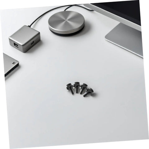 50 Piece M5X25 Metal Server Rack Screw And Cage Nut Kit Delivers RockSolid Grip With Zero Hassle Install For Network Racks And Cabinet Panels with screws on a desk.