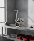 Tough As Nails 304 Stainless Steel Manual Winch Hoist Crank on a workbench, designed for heavy lifting at docks and trailers.