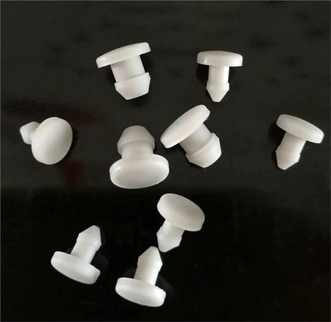 Silicone Rubber Hole Caps And O Ring Assortment Kit With Sizes 2.5 3 3.5 And 4mm, Solid T Type Sealing Plugs For Pipelines And Industrial Equipment, High Temp Resistance From Minus Forty To Two Hundred Fifty Degrees, Perfect For Food Processing, white silicone plugs on black background
