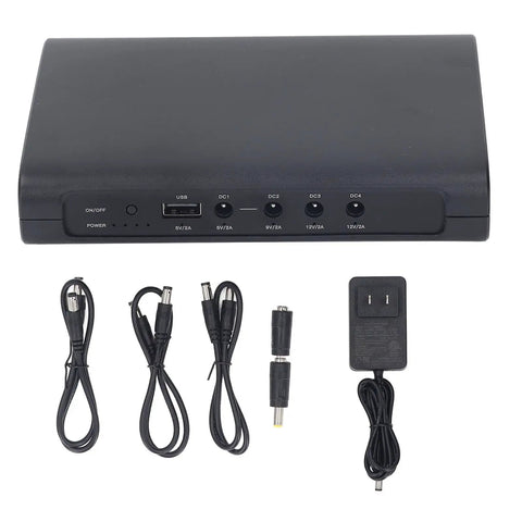 Mini Ups Portable Battery Backup With 15000Mah Capacity Includes 5V 9V And 12V DC Outputs Plus Universal USB Port top view with cables.