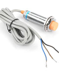 Inductive And Capacitive Proximity Sensor Switch With 3 Wires NPN NC, Precise Detection For Metal And Non Metal Targets, Great For Industrial Automation, Detects Metal Plastic Glass Water And Oil in a coiled wire configuration