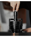 Lock In That Perfect Shot With This 58Mm Magnetic Wdt Tool, stainless steel needle distributor in use for coffee grounds.