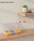 Plastic Hollow Wall Anchors With Stainless Steel Screws For Drywall And Masonry Expansion Mount Kit on wooden shelf next to plant