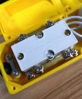 Inside view of Heavy Duty Yellow Crane Pendant Control Box With Rainproof Push Buttons For Hoist Up Down Switching, showing wiring connections.