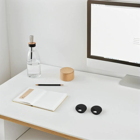 Get Your Desk Totally Clean With This 20 Pcs Cable Grommet Kit For Home And Office Use. Made From Sturdy Black Abs Plastic, These Easy Install Wire Organizers Keep Cables Outta Sight And Make Cleaning A Breeze While You Tackle Any Project In Style on a white desk
