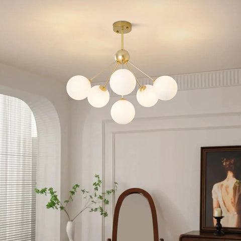 Six Light Frosted White Glass Globe Sputnik Chandelier in Modern Gold Finish for a Lit Statement Flush Mount Ceiling Light